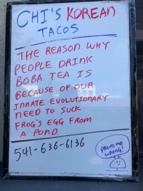 Whiteboard outside Chi's with a joke about boba tea