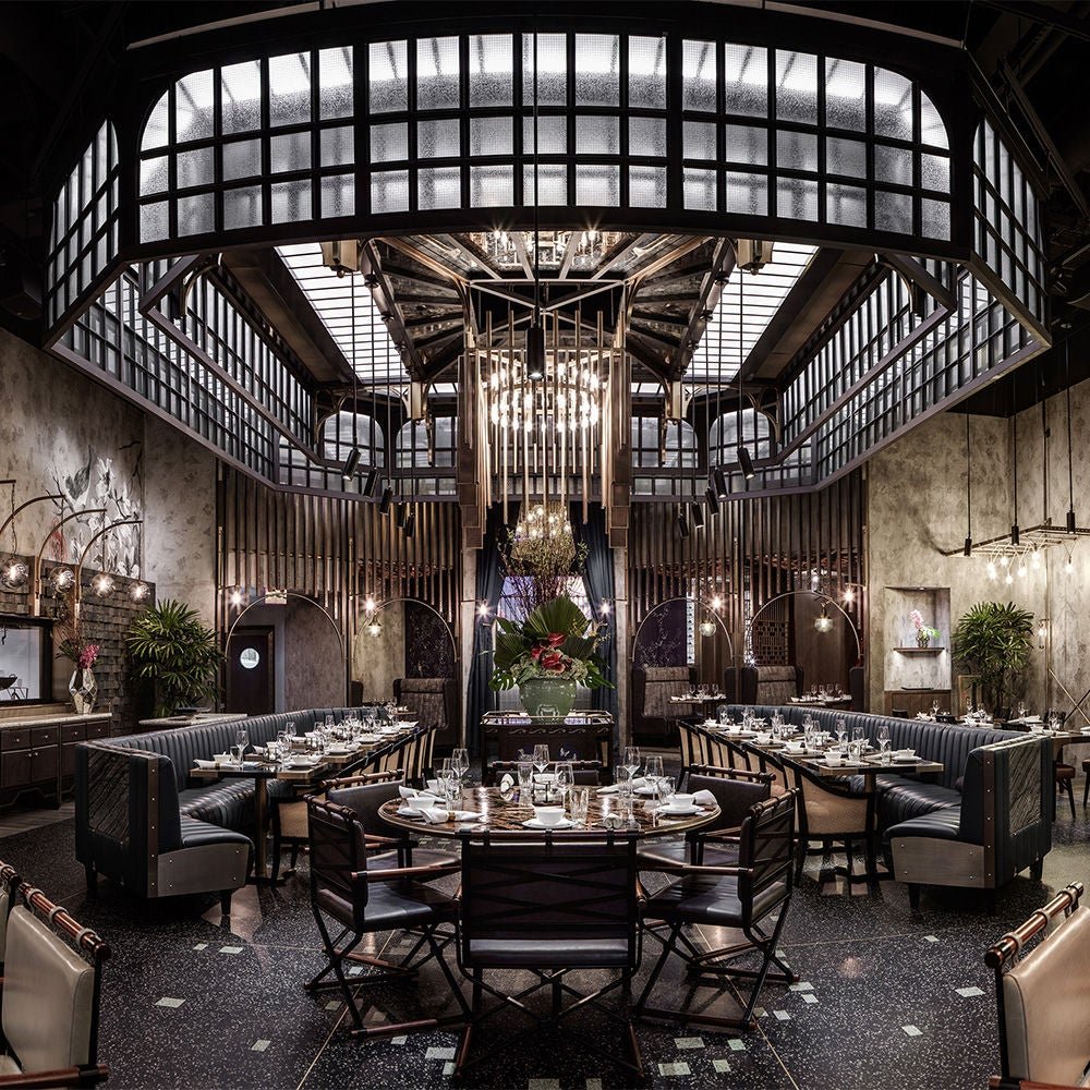 The main dining room at COTE Las Vegas under a glass skylight