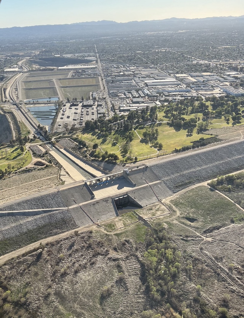 Aerial view of Hansen Dam; the golf course is the green area beside the spillway